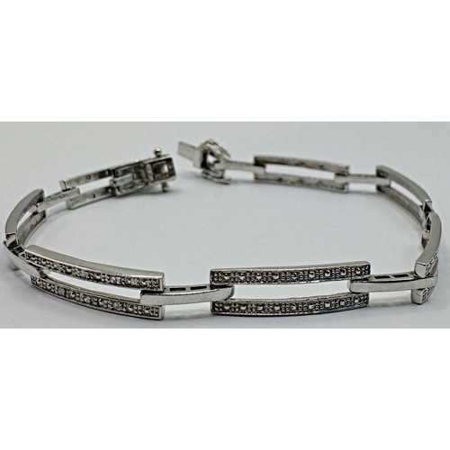 134 - 9ct white gold and illusion set diamond Art Deco style bracelet, 19cm long, 7.8g