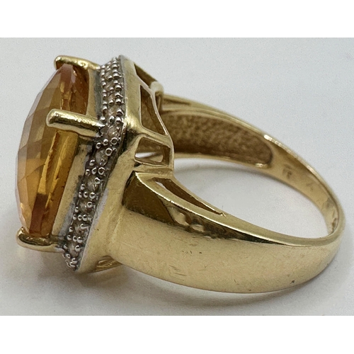 135 - 14ct citrine and diamond set ring, size M, 5.4gq