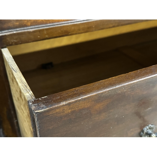 32 - 19th century mahogany chest on chest with blind fret work tracery fitted with nine drawers upon ogee... 