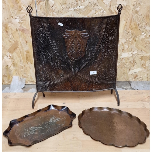 96 - Arts and Crafts embossed copper fire screen 58cm high together with two Arts and Crafts copper trays... 