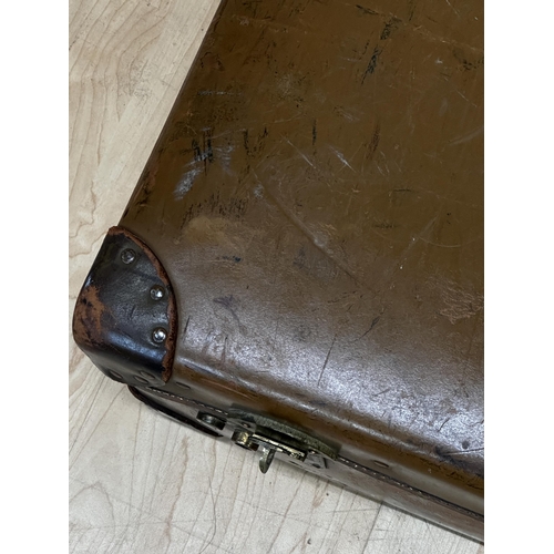 71 - Vintage crocodile leather hard travel case together with a further large leather bound case (2)