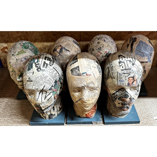 88 - Set of seven decoupage hat or wig stands each 31cm high (7)