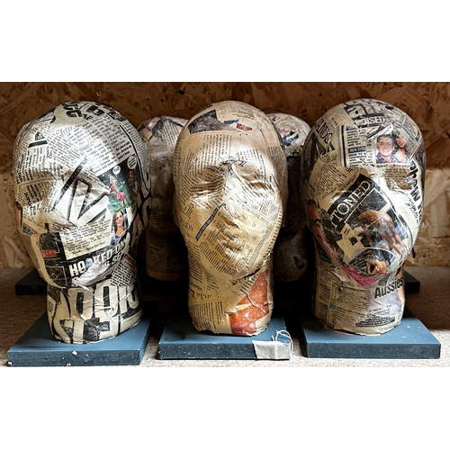 88 - Set of seven decoupage hat or wig stands each 31cm high (7)