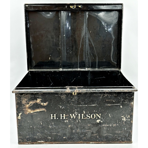 110 - Jappaned tin military trunk inscribed H.H. Wilson, 31 x 51cm, with a trench art shell and campaign b... 