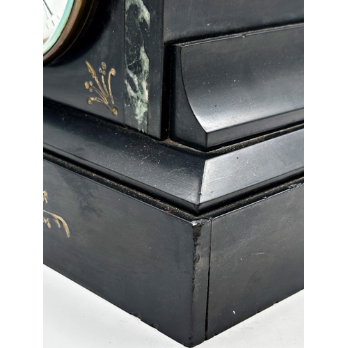 77 - A 19th century black slate mantel clock, 21cm high