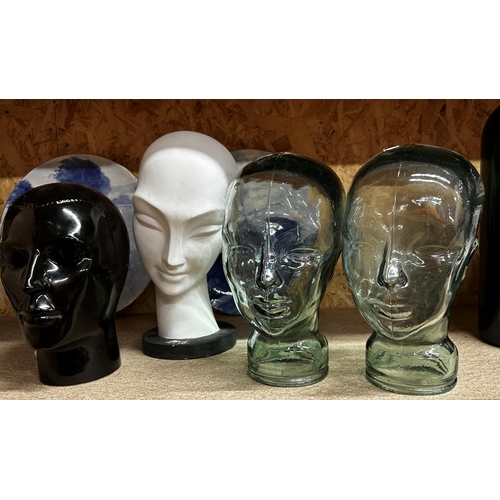 79 - Pair of moulded glass heads possibly wig stands together with a further ceramic and plaster example ... 