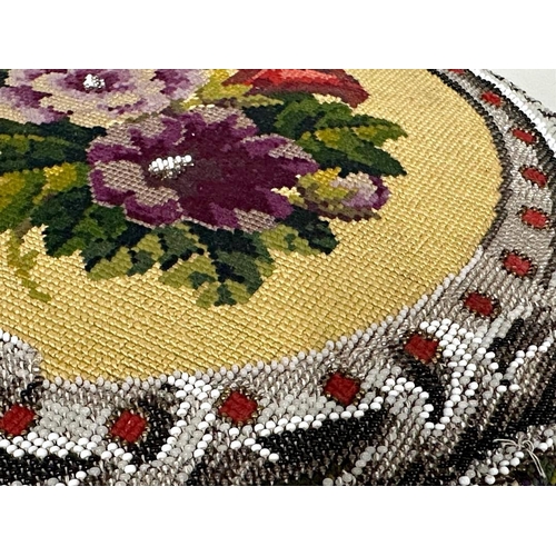 122 - Victorian woolwork and beaded footstool, 24 x 35cm