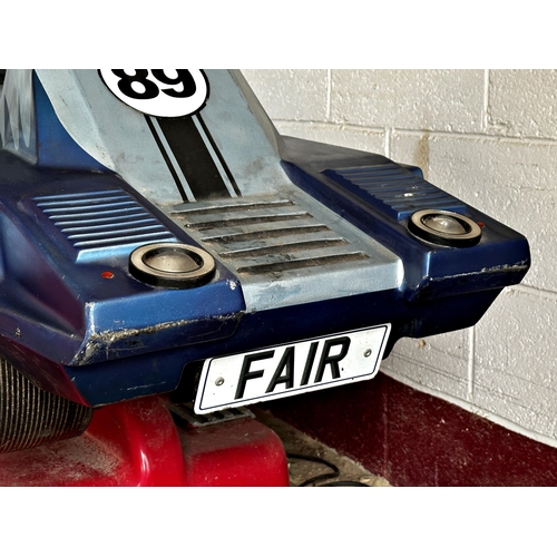 2 - Plug in, coin operated child’s fairground ride-on racing car. Not currently running.
Takes 20p

Meas... 