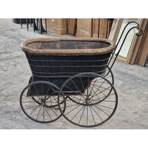 59 - Victorian wicker pram with ceramic handle, 102cm high