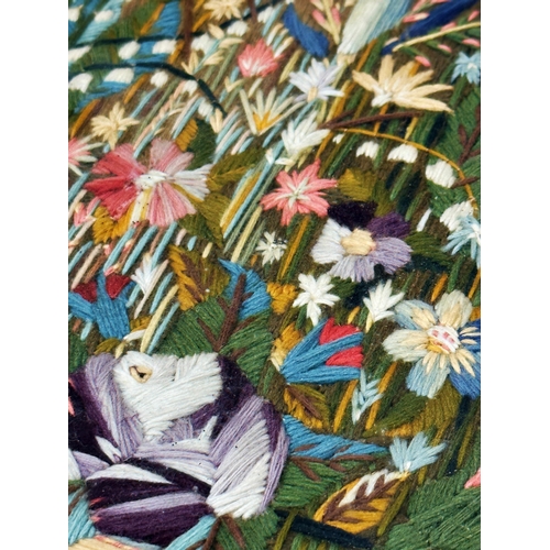 1570 - Good 19th century Folk Art woolwork picture depicting a floral bouquet with butterflies, 57 x 47cm, ... 