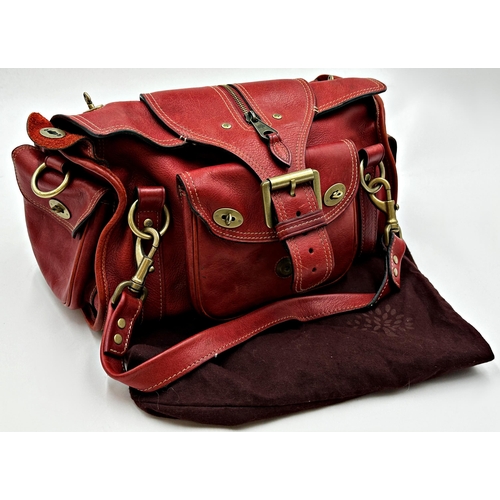 358 - A vintage Mulberry Emmy shoulder bag in oxblood leather.  Gold tone hardware with top flap magnetic ... 