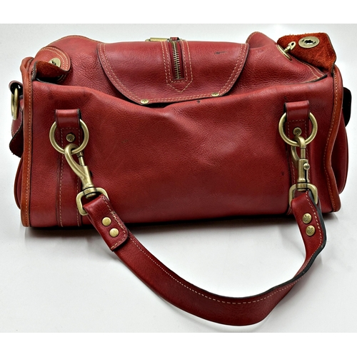 A vintage Mulberry Emmy shoulder bag in oxblood leather. Gold tone