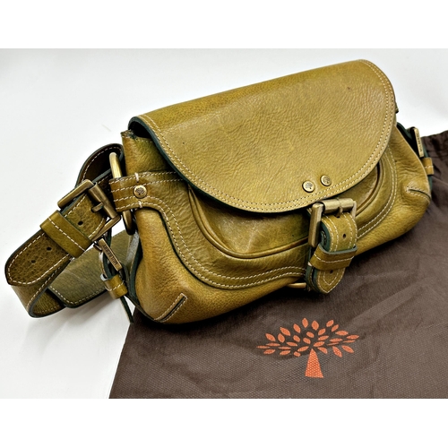 359 - A vintage leather Mulberry handbag in apple green. Gold tone hardware with buckles to the side and f... 