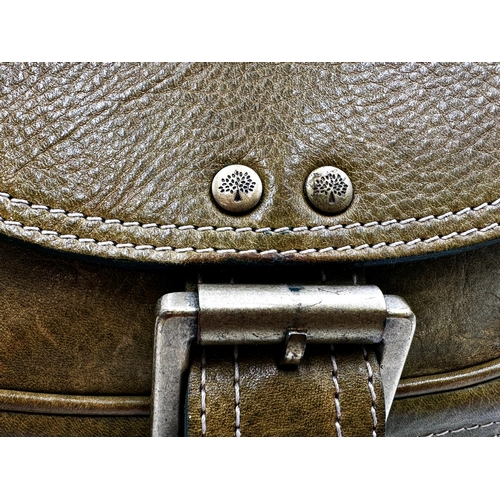 359 - A vintage leather Mulberry handbag in apple green. Gold tone hardware with buckles to the side and f... 