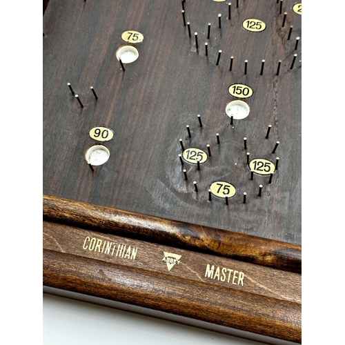 560 - Abbey corinthian master bagatelle board with ball bearings, 72cm long