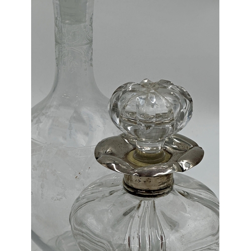 412 - Good silver collared waisted glass decanter of lobed form, 22cm high together with a further glass a... 