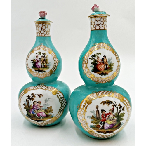 427 - Pair of Dresden porcelain double gourd lidded vases, with painted romantic panels on a turquoise gro... 