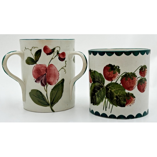 433 - Wemyss pottery 'Sweet Pea' tyg, 14.5cm high with a further Wemyss 'Wild Strawberry' pattern brush po... 