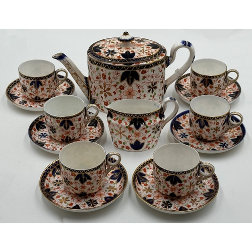 447 - 19th century Crown Derby Imari porcelain tea service comprising teapot, six cups, six saucers and mi... 