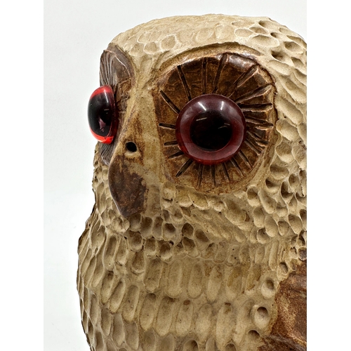 461 - Studio pottery owl with large glass eyes, 32cm high