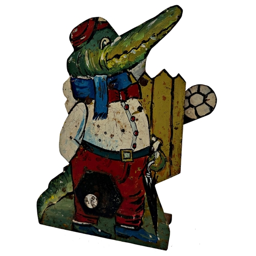 633 - Ex fairground cut steel target in the form of a crocodile in smart dress with push button revealing ... 