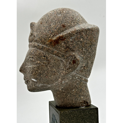 685 - Grand tour basalt bust of an Egyptian pharaoh upon a rectangular plinth base, 24cm high.