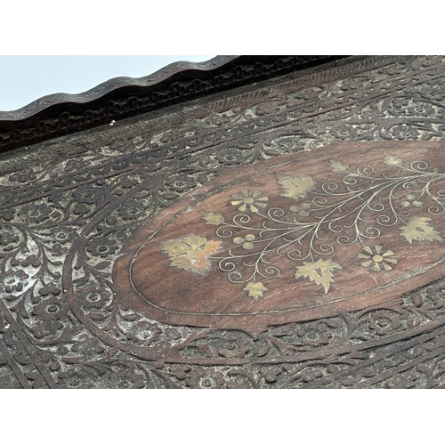 569 - Eastern carved hardwood brass inlaid gallery tray, 51cm x 33cm