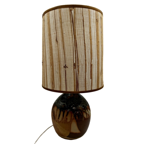 1184 - Canterbury Pottery studio pottery baluster table lamp with mottle drip glaze upon an abstract buff b... 