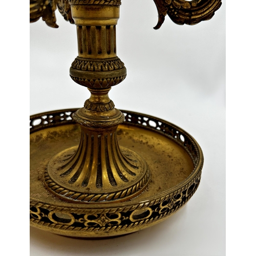 1187 - A French ormolu three branch table lamp with three rococo branches upon a decorative column and dish... 