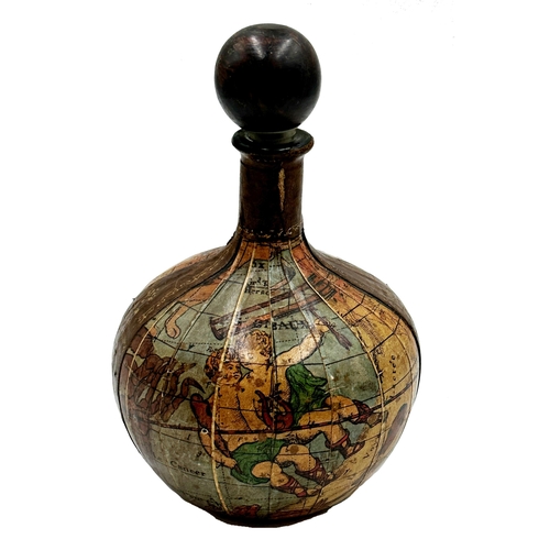 704 - Unusual leather applied glass decanter decorated with cherubs and gilt tooled panels, 27cm high