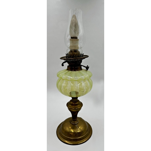 1188 - A good Art Nouveau brass and vaseline glass oil lamp, 43cm high (converted to electricity).