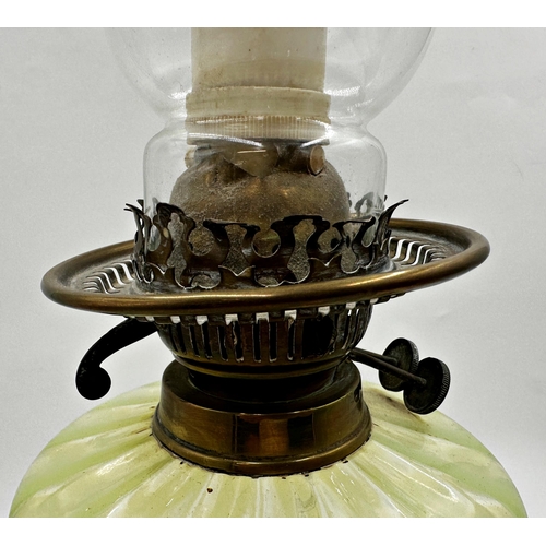 1188 - A good Art Nouveau brass and vaseline glass oil lamp, 43cm high (converted to electricity).