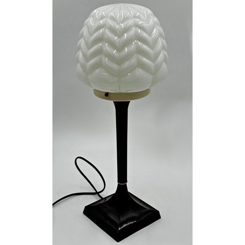 1189 - A good quality Art Deco Bakelite table lamp with swept square base and shaped opaline shade, 46cm hi... 