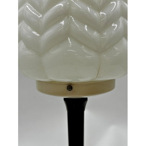 1189 - A good quality Art Deco Bakelite table lamp with swept square base and shaped opaline shade, 46cm hi... 