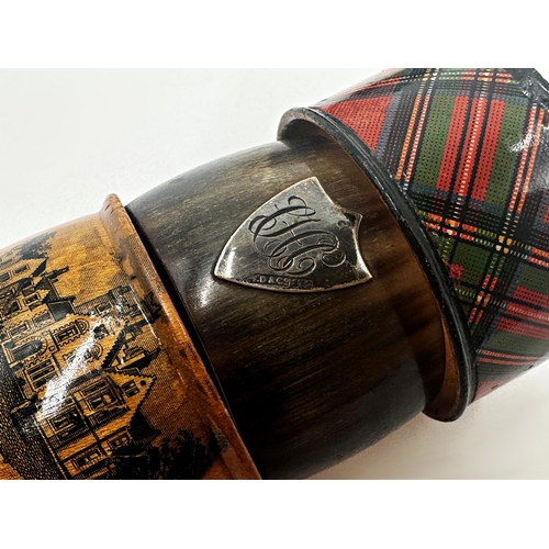 707 - Two Mauchline ware napkin rings with Kildalton House, Islay and Islay House, together with a pair of... 