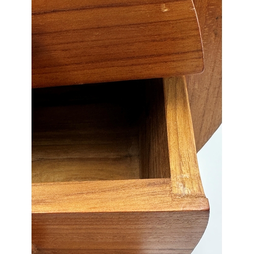 573 - Mid 20th century satinwood table top cabinet of circular form, fitted with four shaped drawers upon ... 