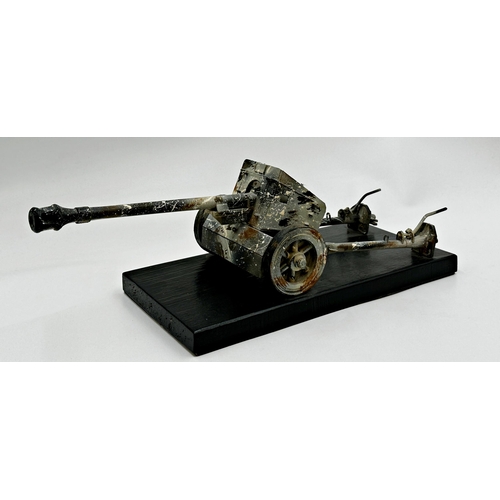 686 - Scale model of an artillery cannon with original paintwork upon a black plinth wooden base, 41cm lon... 