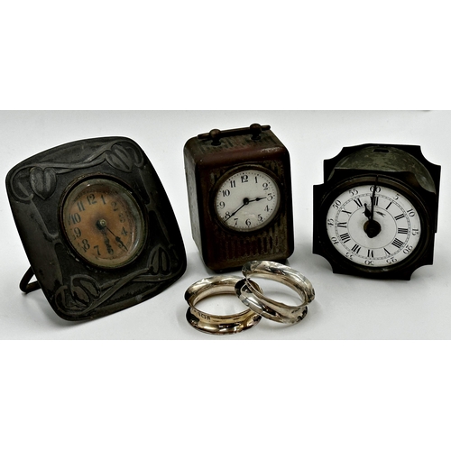 372 - Mixed lot comprising an Archibald Knox style pewter cabinet clock, a further cabinet clock, a French... 