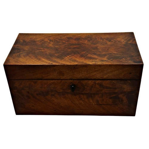 581 - Regency flame mahogany tea caddy the hinged lid enclosing a fitted interior glass mixing jar and two... 