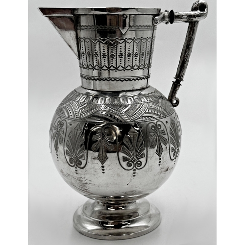 329 - In the manner of Christopher Dresser- A silver plated aesthetic period water jug engraved with Arts ... 