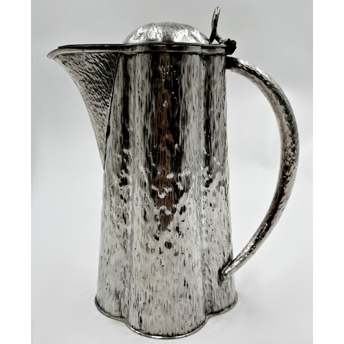 330 - Hukin and Heath textured silver plated water jug, of lobed form, 22cm high