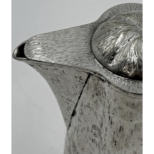 330 - Hukin and Heath textured silver plated water jug, of lobed form, 22cm high