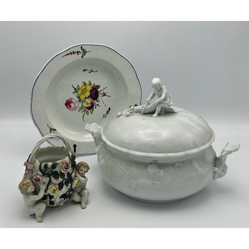 474 - Meissen Blanc de chine porcelain twin handled turine mounted by a cherub holding a cornucopia with s... 