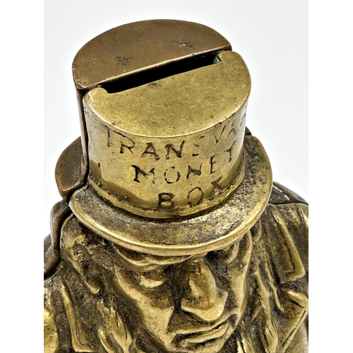 650 - Mixed collection of brassware to include an old cast brass figural money box in the form of presiden... 