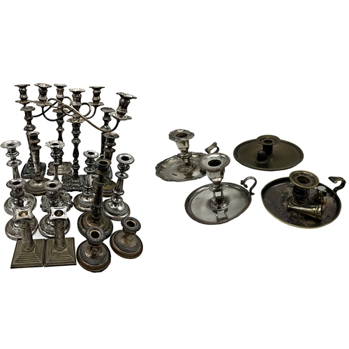 332 - Large collection of silver plated candlesticks mostly in pairs together with a pair of candelabra an... 