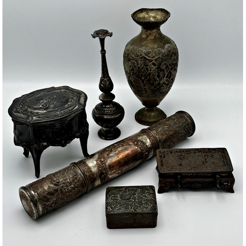 654 - Collection of Eastern metalware to include an Indian silver plated scroll holder with baize lined in... 