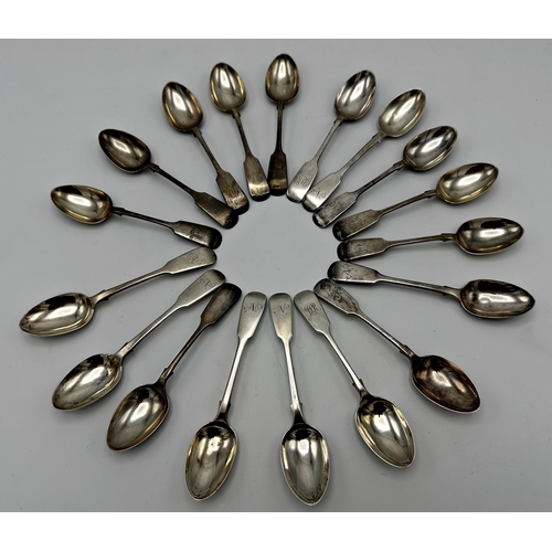 275 - Eighteen antique silver fiddle teaspoons, 14oz approx