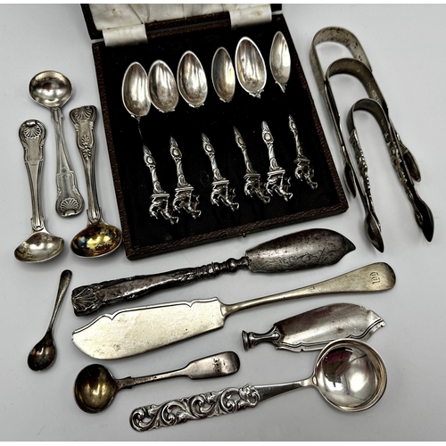 284 - Mixed collection of fancy silver flatware to include cased set of six character spoons mounted by St... 