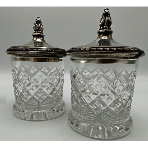 285 - Pair of silver topped cut glass preserve pots, 13cm high (2)