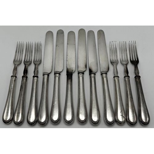 286 - Set of beaded white metal (untested) handled flatware for six, comprising knives and fork, steel bla... 